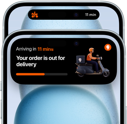 iPhone 15 showing Dynamic Island expanded view of Doordash delivery status