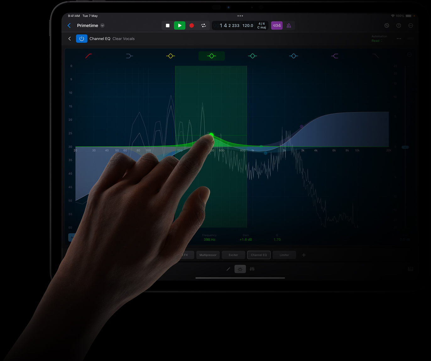 Hand touching an iPad Pro screen to edit a sound wave in Logic Pro for iPad on iPad Pro.
