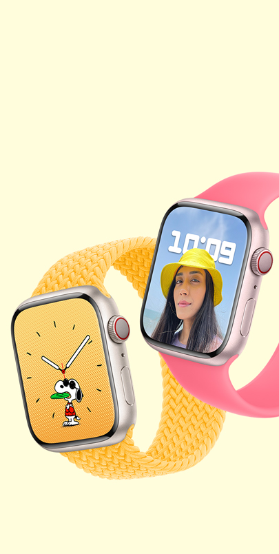 Two Apple Watch Series 9. The first has a Snoopy watch face and a Sunshine Braided Solo Loop. The second has a Portraits watch face and a Pink Solo Loop.