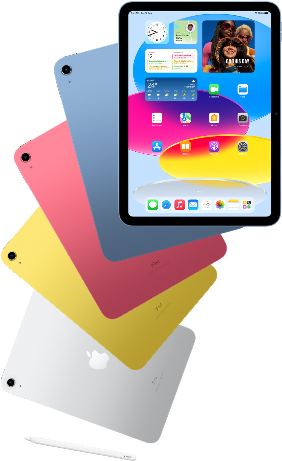 Front view iPad shows the home screen with blue, pink, yellow, and silver rear-facing iPads. An Apple Pencil sits nears the arranged iPad models.