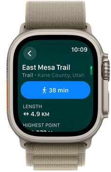 A front view of a watch with the name of a trail and its distance