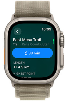 A front view of a watch with the name of a trail and its distance