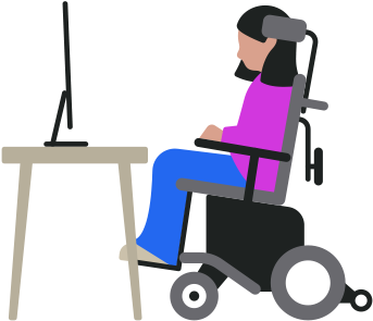 전동 휠체어를 탄 사람이 책상에 놓인 Mac 컴퓨터를 보고 있는 모습