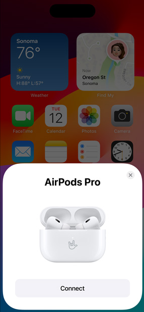 Proces parowania iPhone’a ze słuchawkami AirPods Pro ozdobionymi grawerunkiem.