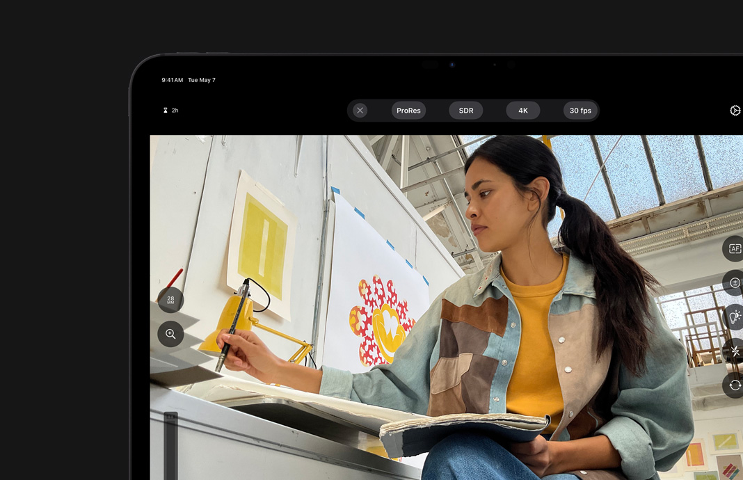 iPad Pro Camera settings showing ProRes capture turned on next to image of woman artist on iPad Pro.