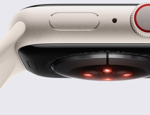 Снимка на долната част на Apple Watch, показваща сензор.