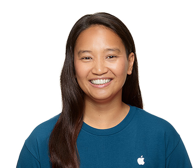 Foto de uma especialista do Suporte da Apple sorrindo