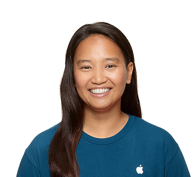 Foto de uma especialista do Suporte da Apple sorrindo