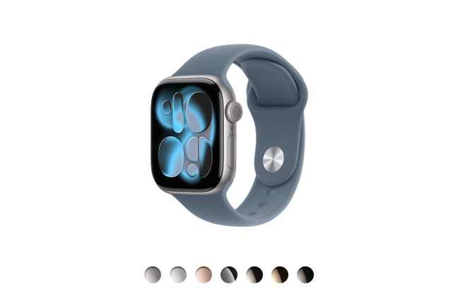 Parte da frente do Apple Watch Series 11 com caixa cinza-espacial de alumínio, pulseira esportiva azul-âncora, Digital Crown, microfone com Isolamento de Voz e botão lateral, disponível em quatro cores com caixa de alumínio e em três cores com caixa de titânio