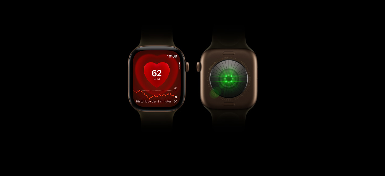 Deux Apple Watch Series 12, boîtier en aluminium, couleur bronze foncé, bracelet sport olive, l’une placée de face avec l’app Fréquence cardiaque qui s’affiche, l’autre placée de dos pour montrer le système de suivi de santé et ses voyants DEL verts lumineux
