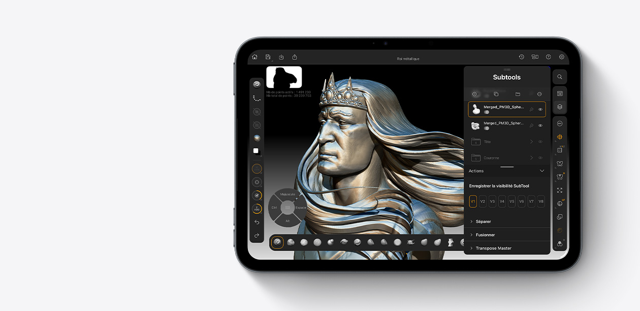 iPad mini couleur minuit, affichant une app de rendu 3D montrant un buste de roi métallique avec une couronne, de longs cheveux et une armure détaillée.