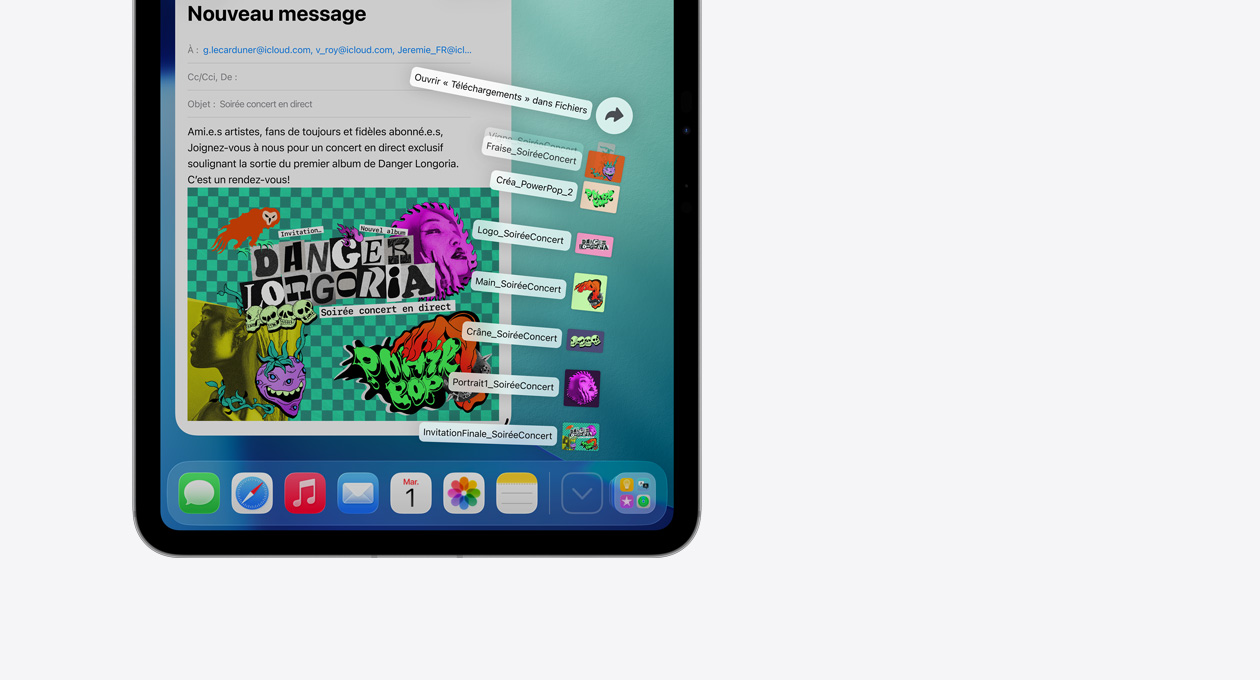 Gros plan sur les apps du Dock au bas de l’écran, avec un éventail de fichiers qui se déploient à la verticale