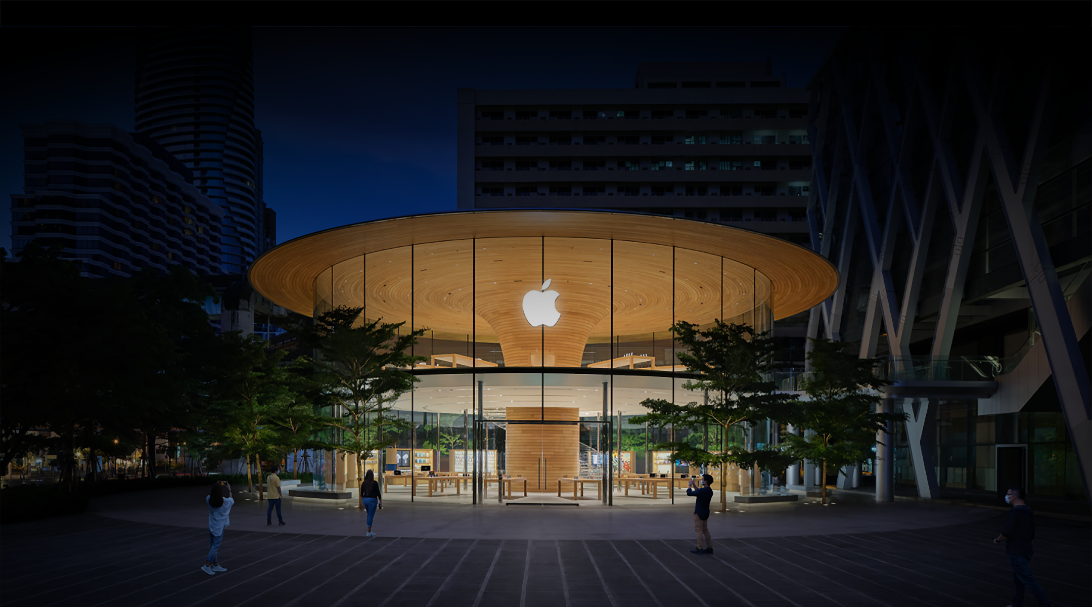 Exterior of an Apple Store location at night.