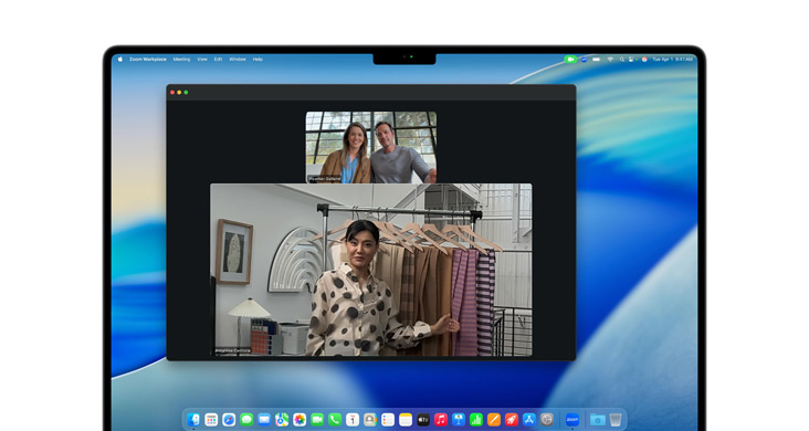 MacBook Pro 16-inch with Mail and iPhone Mirroring the Uber Eats app onscreen.