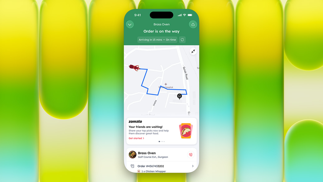 iPhone screen displayed within MacBook Neo screen, showing Uber Eats app