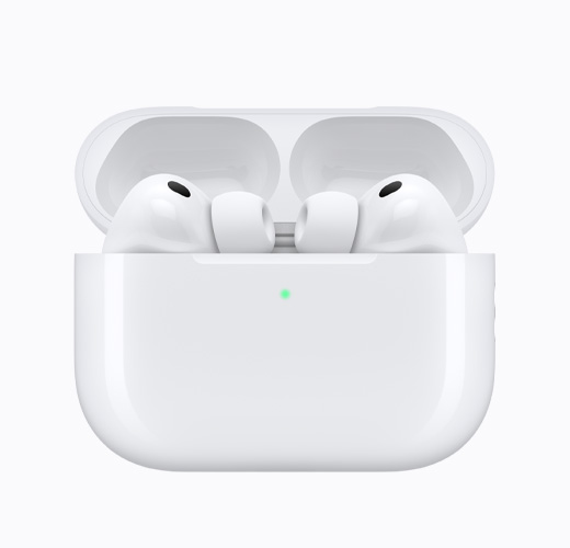 AirPods 4 inside an open white charging case