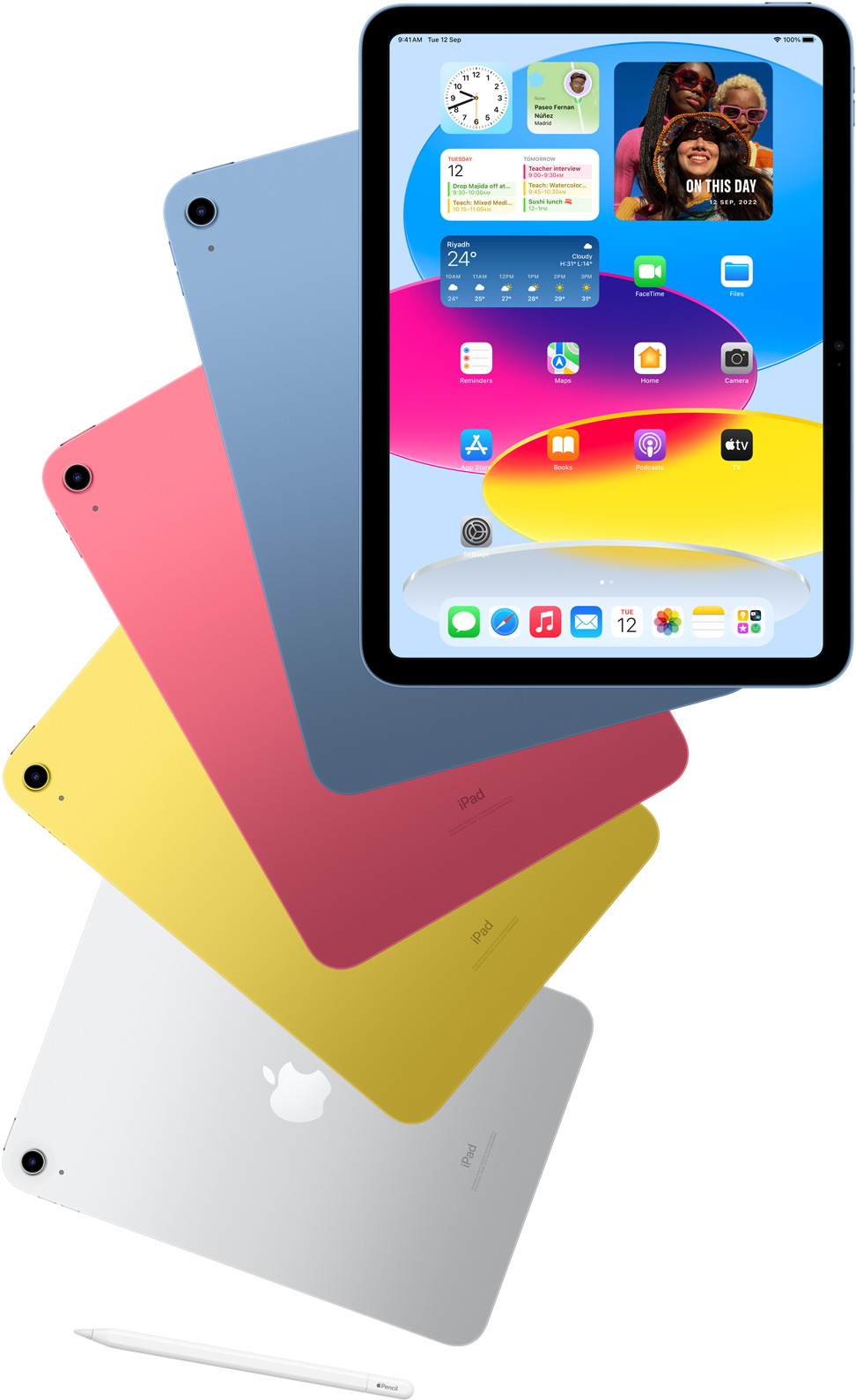 Front view iPad shows the home screen with blue, pink, yellow, and silver rear-facing iPads. An Apple Pencil sits nears the arranged iPad models.