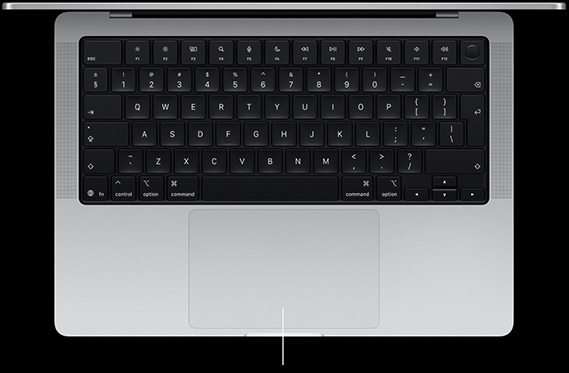 Top-down view of open MacBook Pro 14-inch showing Force Touch trackpad located below keyboard
