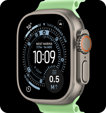 Apple Watch Ultra 3 with a silver titanium case and Green Loop band.