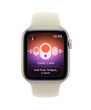 Apple Watch SE 3, aluminium case, starlight colour, screen shows health tracking (cycle tracking), right side exterior, Digital Crown dial, Sport Band, sand colour (pale tan)