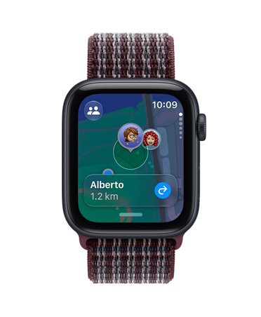 Apple Watch SE 3, aluminium case, midnight colour, screen shows Find My app (memojis on a map background), right side exterior, Digital Crown dial, Sport Loop band, burgundy plaid colour
