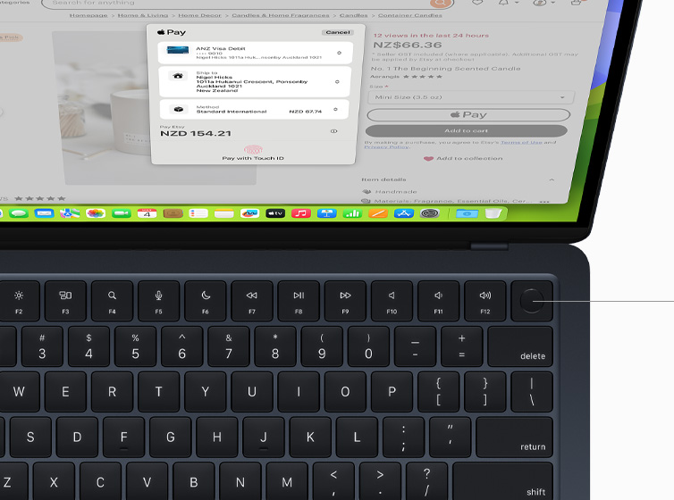 Top view of MacBook Air showcasing Touch ID and Magic Keyboard working with Apple Pay