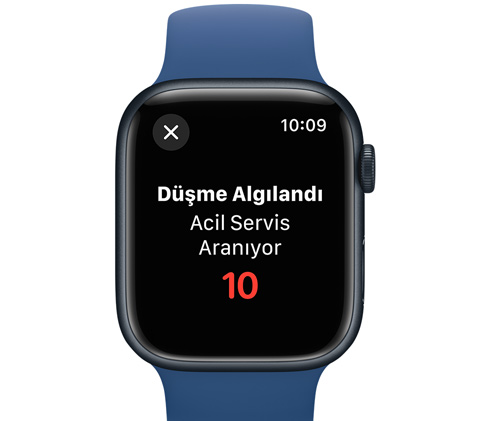 Apple Watch’un önden görünümü ve ekranında 10 saniye içinde acil servisin aranacağını belirten bir mesaj. 