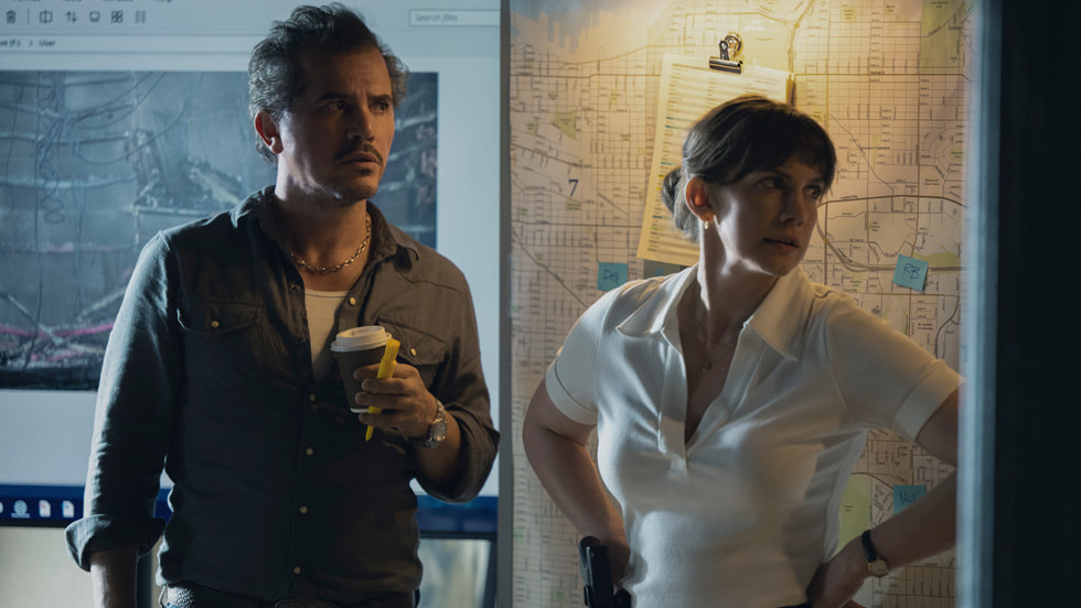 John Leguizamo and Anna Chlumsky in “Smoke,” premiering June 27, 2025 on Apple TV+.