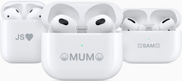 Three AirPods Charging Cases are engraved with example emojis: initials, an I-love-you hand sign and a unicorn.