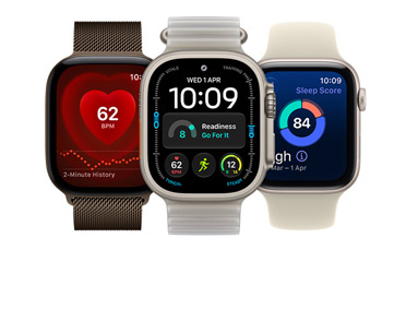 Apple Watch Series 12, aluminum case, dark bronze color, screen shows heart health feature, Milanese Loop band, dark bronze color; Apple Watch Ultra 4, titanium case, natural color, screen shows vitals, workout, readiness features, Ocean Band, translucent kelp color (pale brownish-green); Apple Watch SE 3, aluminum case, starlight color, screen shows sleep score, Sport Band, sand color (pale tan)
