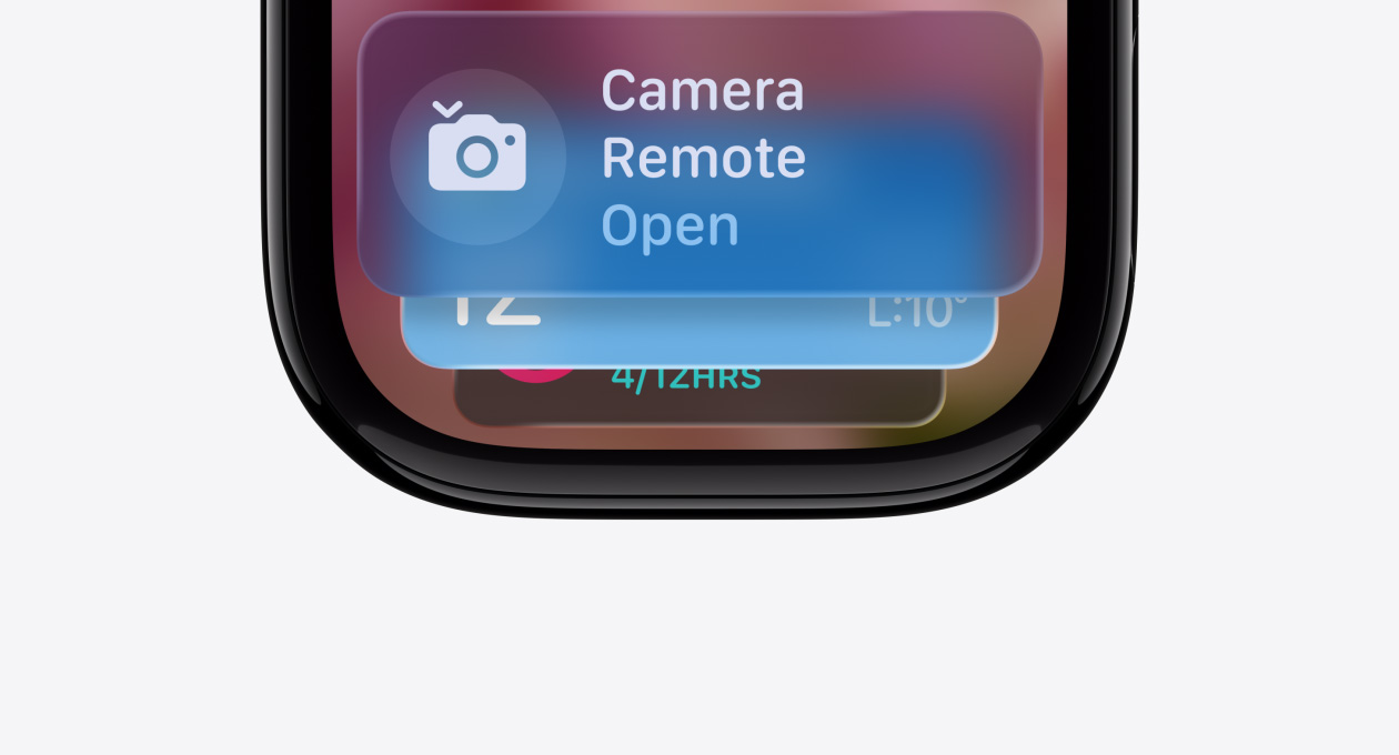 Apple Watch in Jet Black with no strap, face shows Smart Stack hint indicator
