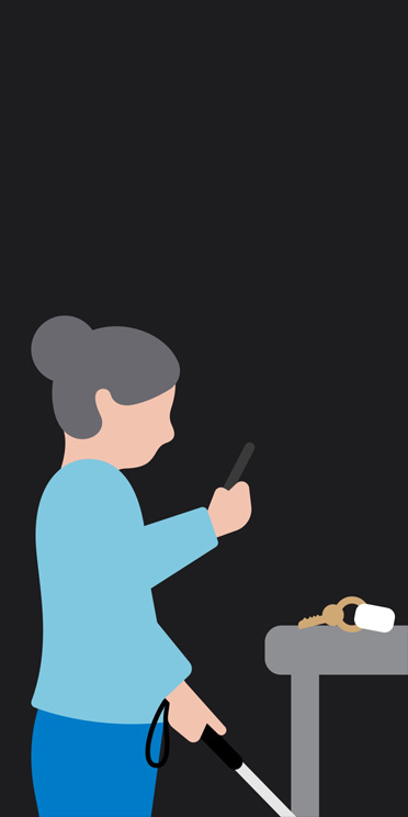 Illustrazione di una donna in piedi e di profilo con un bastone bianco in mano, che punta un iPhone verso un mazzo di chiavi su un tavolo di fronte a sé