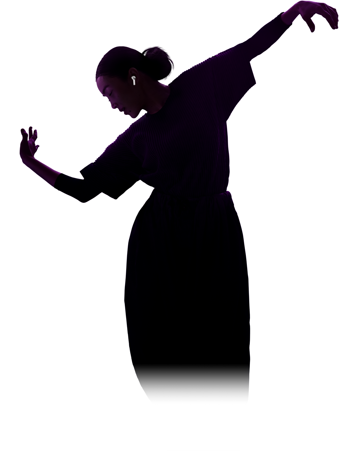 A person wearing AirPods 5 as they move with their arms spread wide