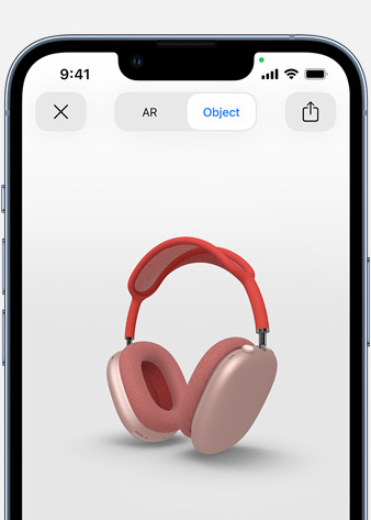 Εικόνα που δείχνει AirPods Max σε Ροζ χρώμα σε οθόνη Επαυξημένης Πραγματικότητας στο iPhone.