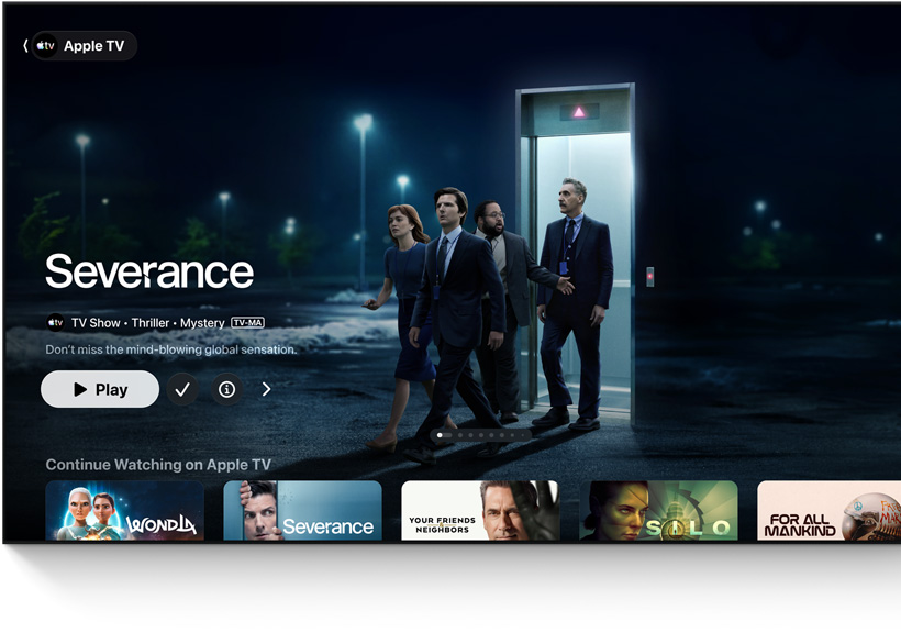 Apple TV ‑appi, esittelyssä Severance, henkilöitä kävelee ulos hissistä parkkipaikalle, jatka katselua ‑rivi alla