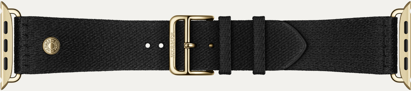 Apple Watch Hermès Series 12 Noir 黑色 Satin Clou de Selle 錶帶細節,光滑的黑色緞面織帶搭配燦金色五金飾件
