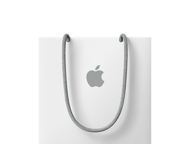 En hvit Apple-handlebag vises med grå håndtak og en grå, midtstilt Apple-logo.