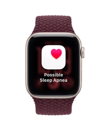 Apple Watch SE 3, screen shows possible sleep apnea notification, aluminum case, starlight color, right side exterior, Digital Crown dial, connected to Braided Sport Loop band, burgundy color