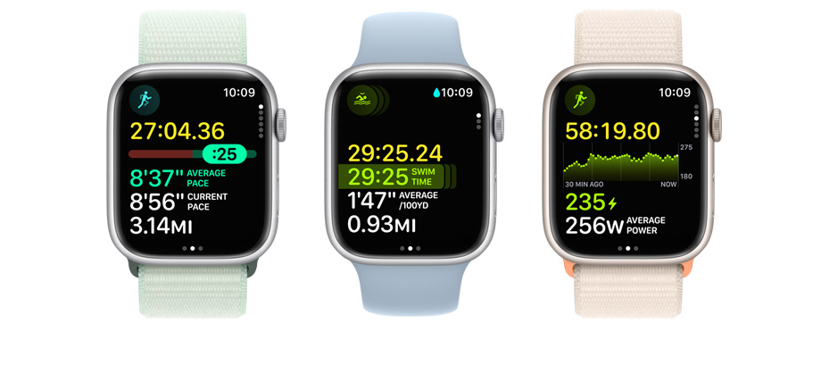 Imagem de três Apple Watch, cada um com métricas e vistas de treino no ecrã.