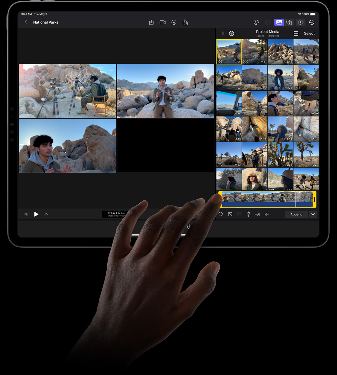 手指輕點 iPad Pro 的顯示器，在 iPad 版 Final Cut Pro 的 angle editor 中選取影片。