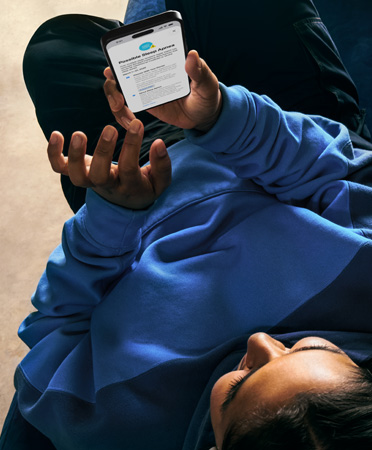 A person checks details of their possible sleep apnoea alert on an iPhone