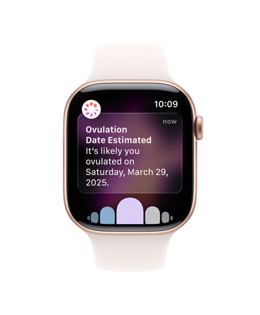 Widok z przodu Apple Watch Series 10 z białym paskiem sportowym, na ekranie: Owulacja, Historia cyklu