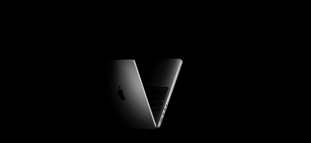 MacBook Pro posicionado em formato de V, fazendo referência ao chip M5