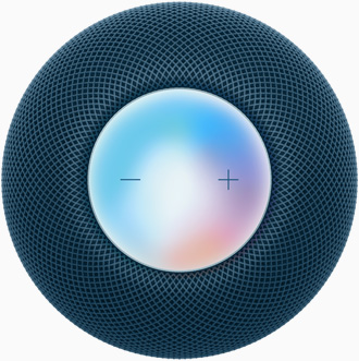 Vista desde arriba de un HomePod mini azul con los símbolos más y menos para regular el volumen sobre una pantalla multicolor.