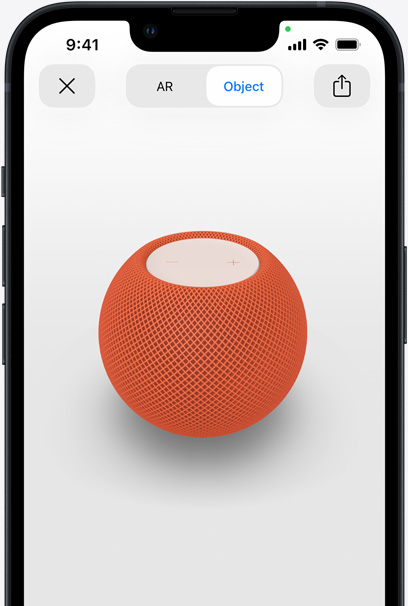 Oranje HomePod in de AR-weergave op het scherm van een iPhone.