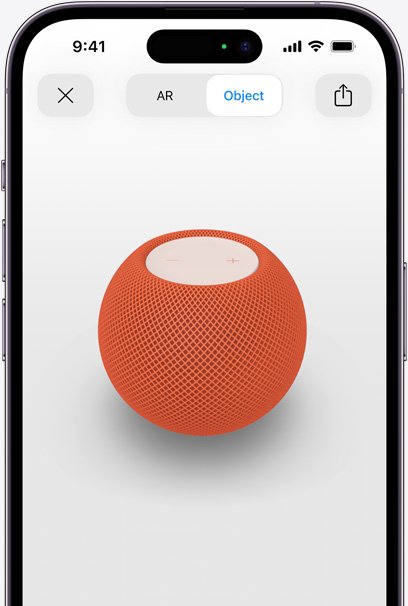 Orange HomePod on the screen of an iPhone in AR view.