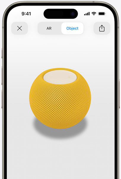 Keltainen HomePod iPhonen näytöllä lisätyn todellisuuden näkymässä.