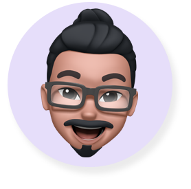 Memoji 笑臉，一位戴眼鏡留鬍鬚的男性