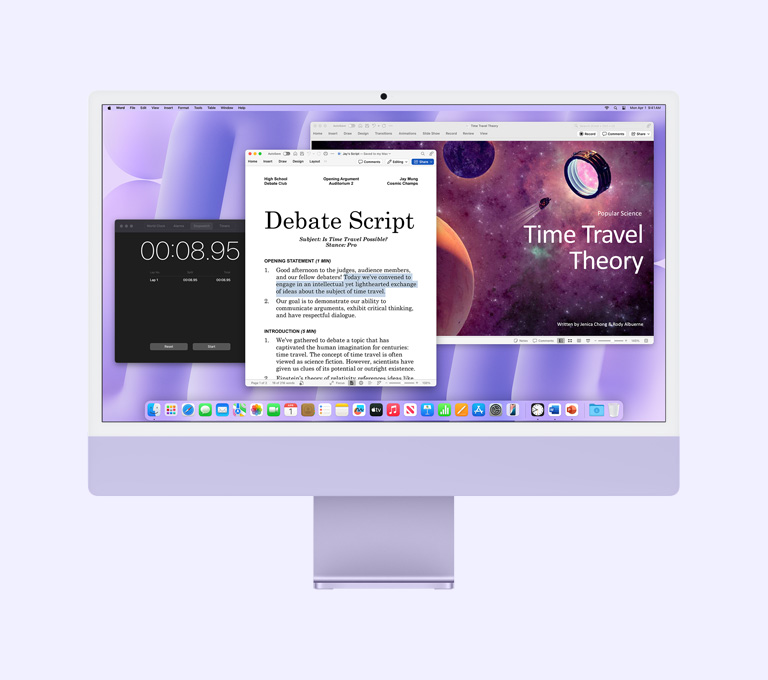 iMac violet affichant à l’écran les apps Microsoft Word, Microsoft PowerPoint et Horloge.