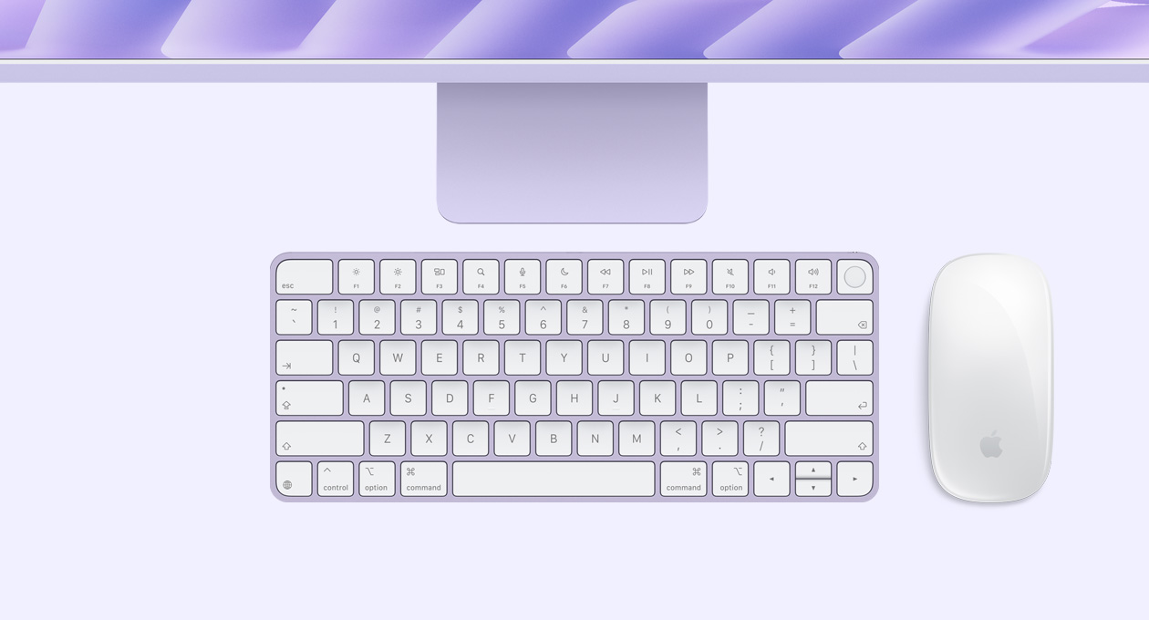Parte de cima externa do iMac roxo com Magic Mouse e Magic Keyboard com Touch ID